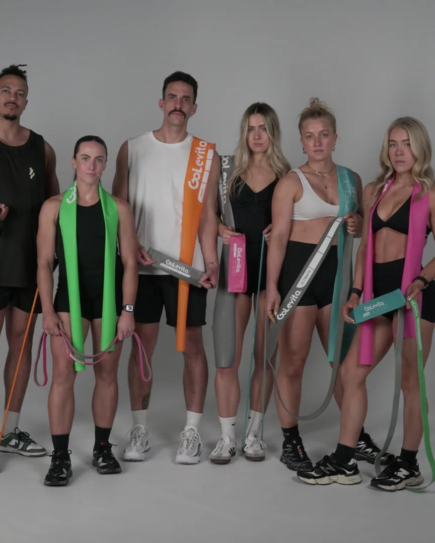 Six GoLevita athletes with the colour band range in the studio